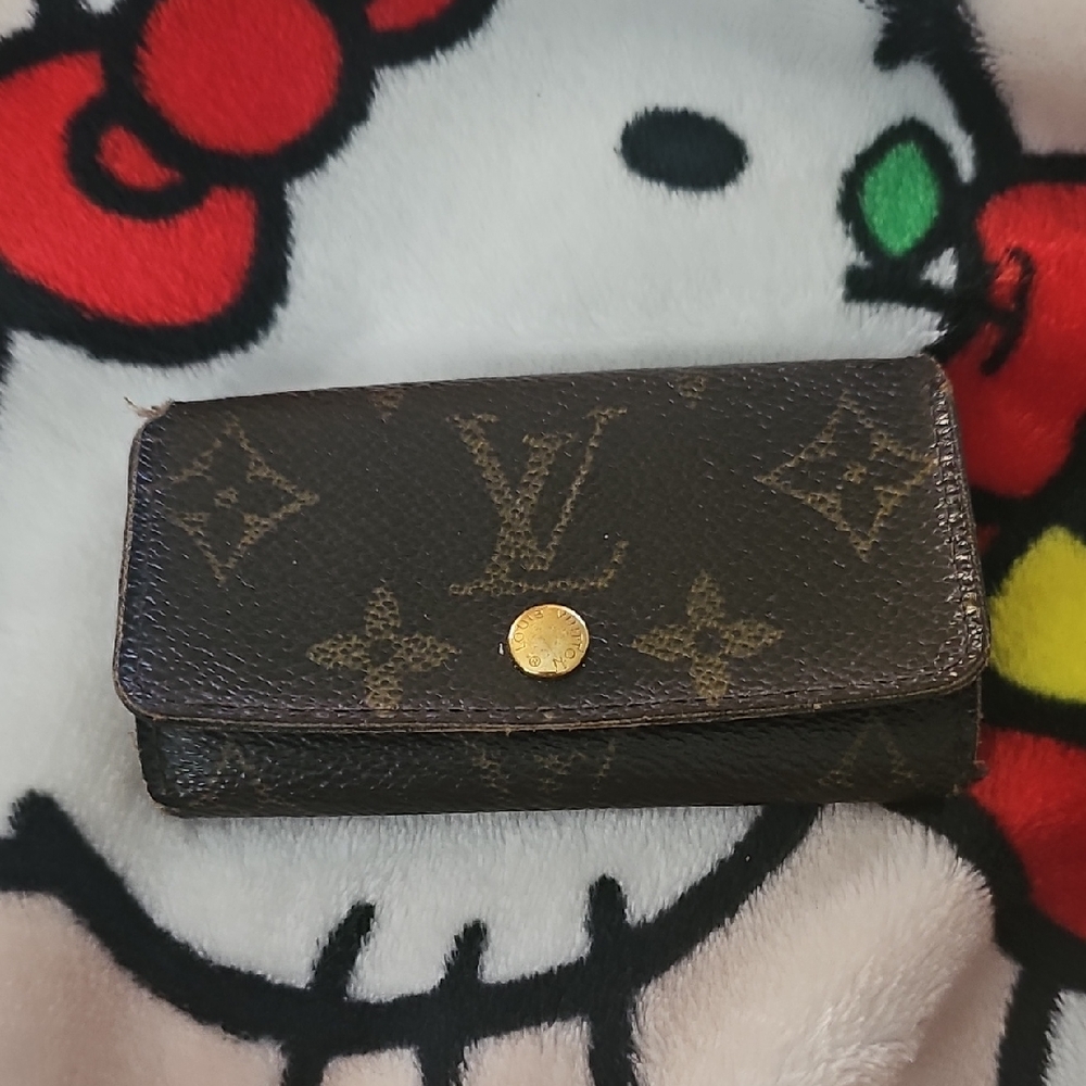 Louis Vuitton Monogram Canvas Trifold Wallet in Brown with Gold Snap